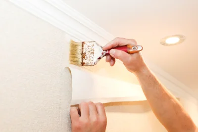 Pose de papier peint à Montvalen — revêtements muraux et toiles de verre